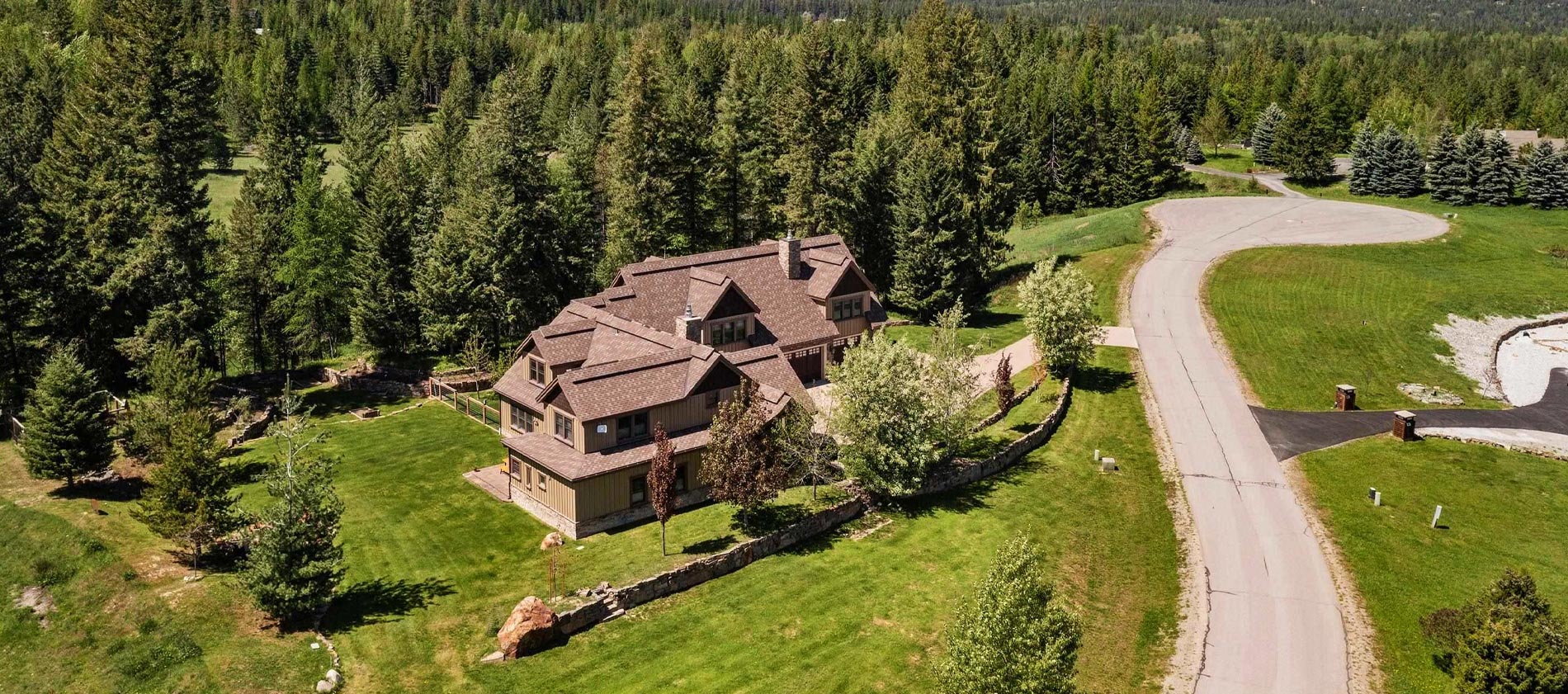 Northwest elegance, timeless materials and glorious views combine to make this Ravenwood Estates