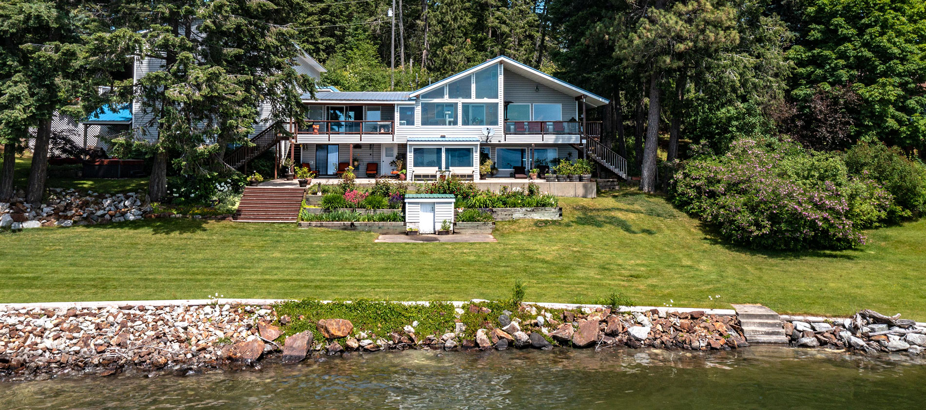 Enjoy 178 feet of your very own private shore line on beautiful Lake Pend Oreille.