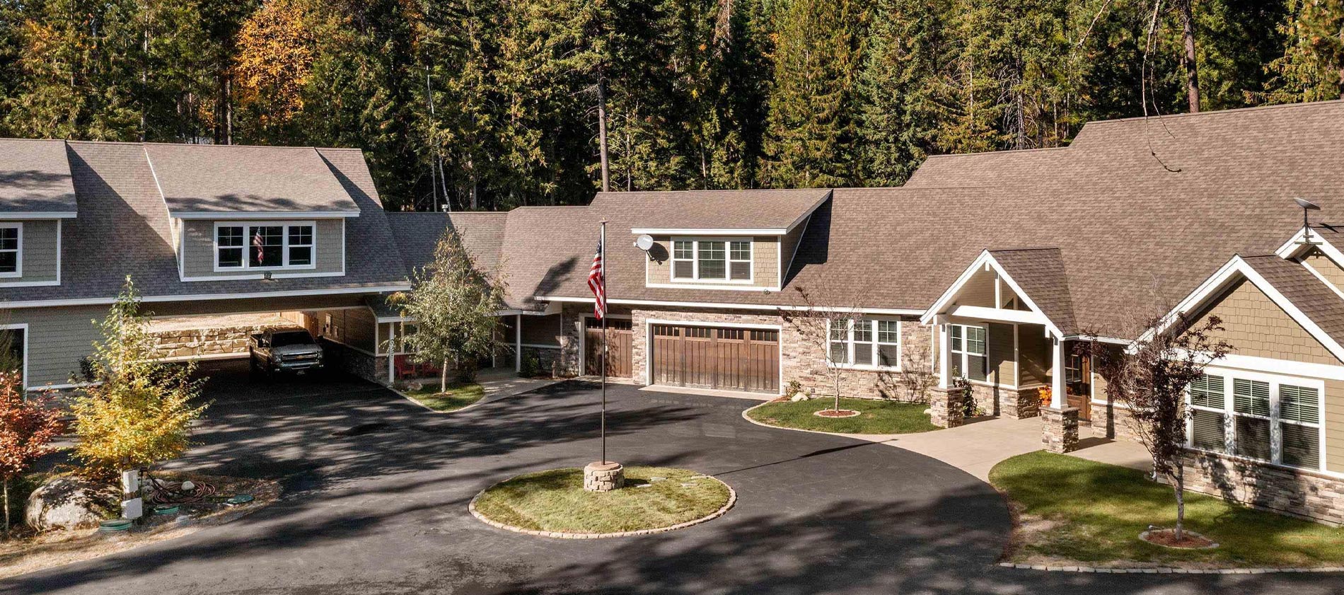 Nestled on 5 forested acres, this elegant estate boasts a spacious main home