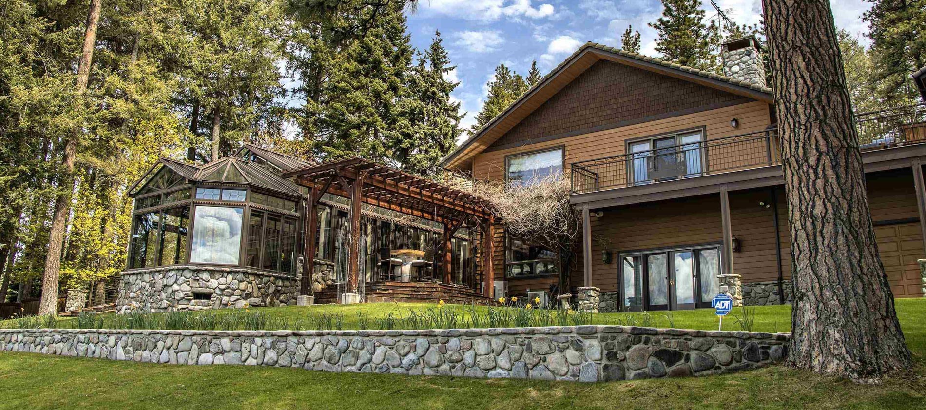 custom waterfront home sits on 1.25 acres with just over 105' of water frontage