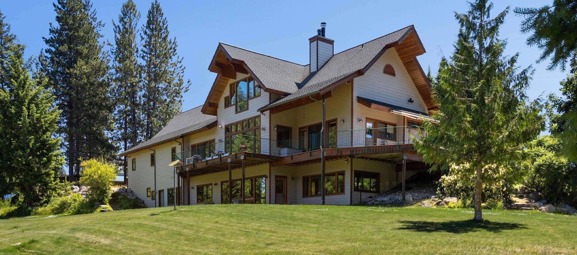 50-acre legacy estate boasts a lux Western Mountain home, enviable shop, craft building, large barn 