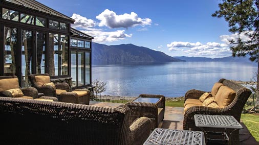 breathtakingly picturesque views of the Green Monarch Mtns. This unique custom waterfront home