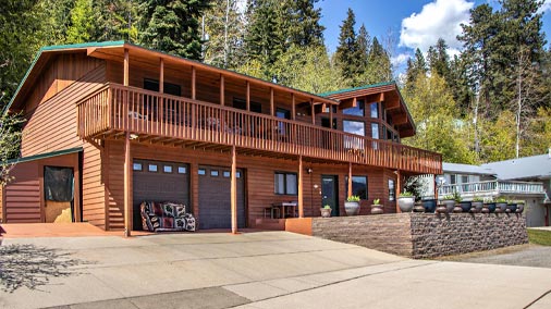 Wrap yourself in luxury in this absolutely stunning waterfront log home, just two miles to Sandpoint